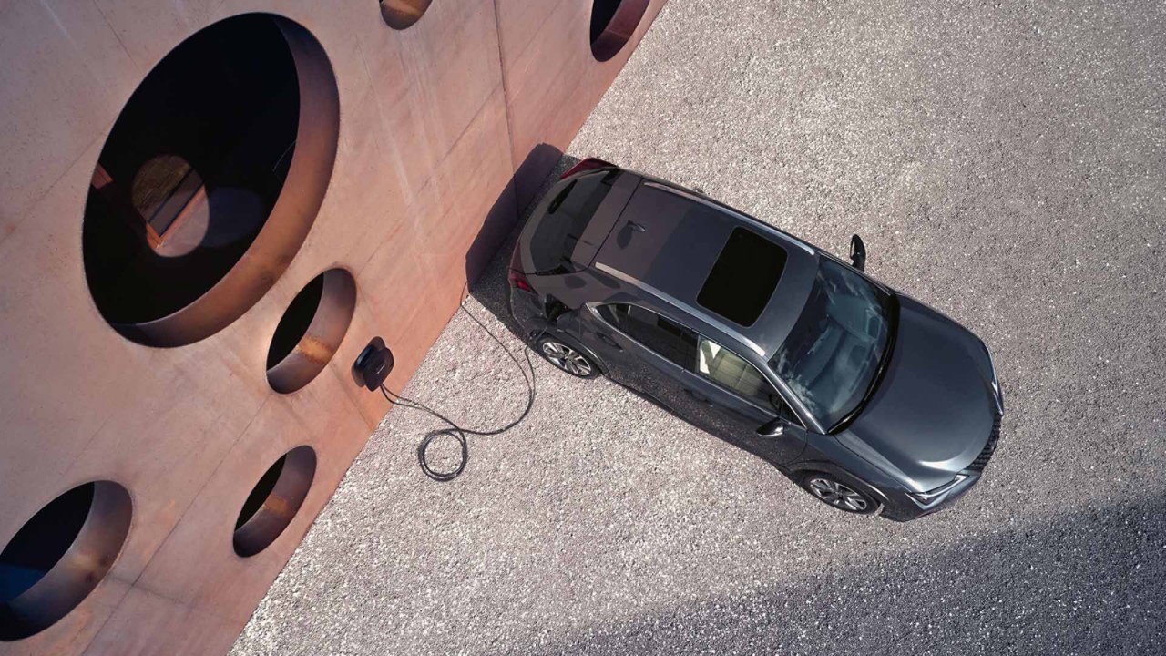 Aerial view of a Lexus UX 300e charging